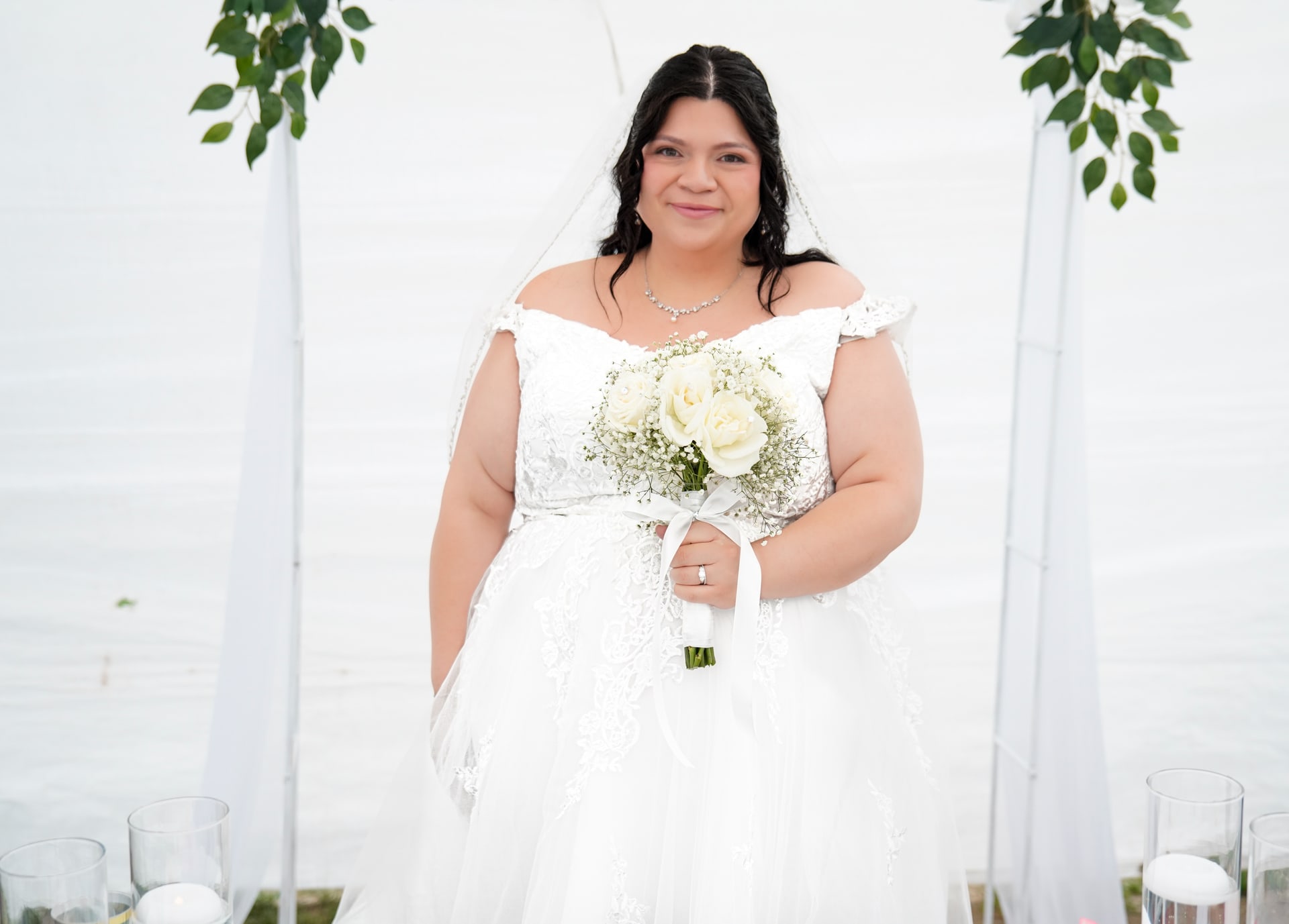 Bride holding a white bouquet during her wedding portrait